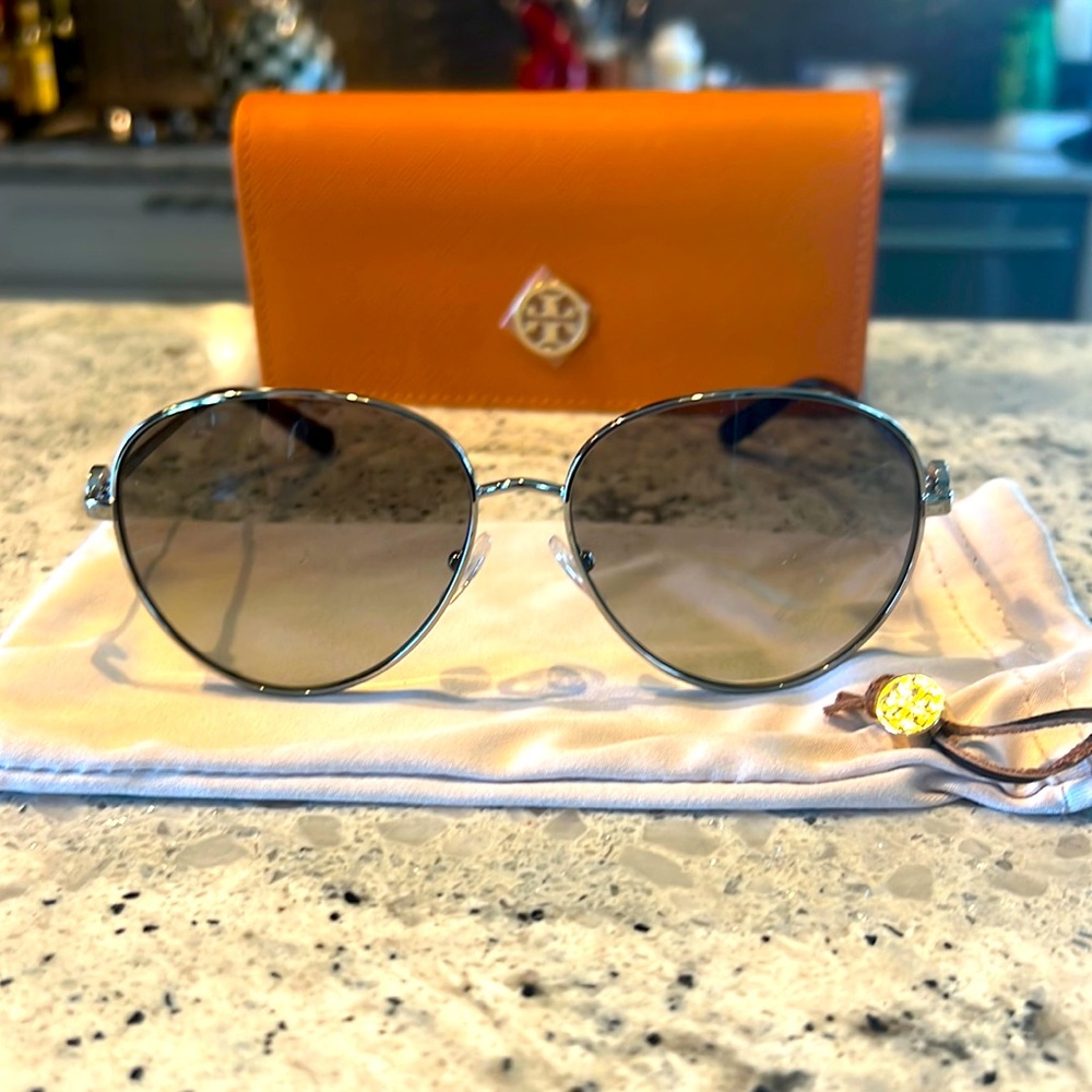 Worn once.  Tory Burch Aviator Sunglasses.  With case and cloth case.
